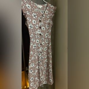 Dress is by Monteau Los Angelas, M (girls jr) mauve colored w/white flowers